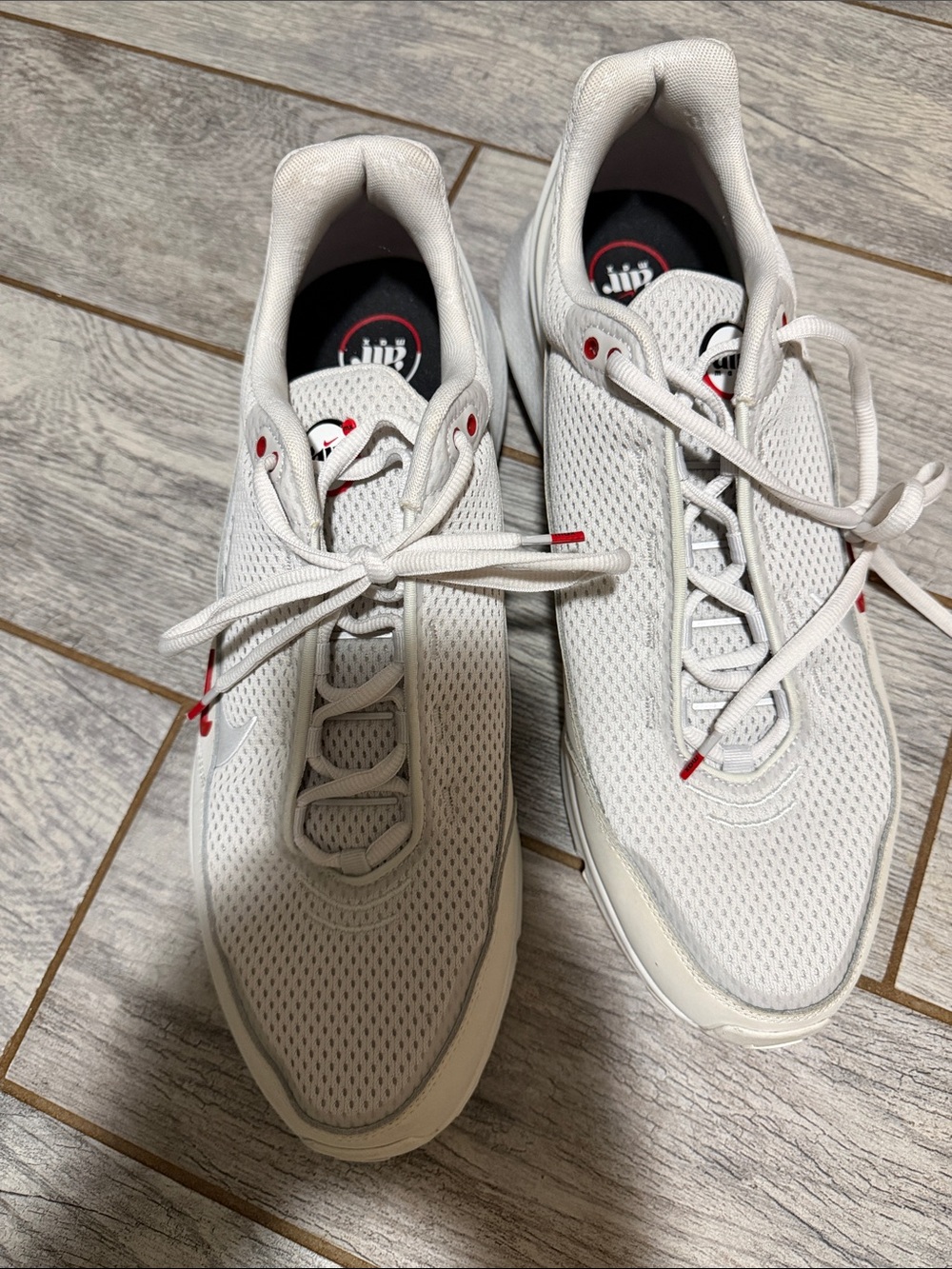 Nike Men’s White Athletic Sneakers with Red Accents